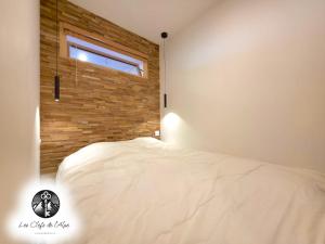 Postel nebo postele na pokoji v ubytování Rénové - Cosy & idéalement situé - Coup de coeur