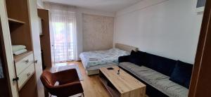 Postel nebo postele na pokoji v ubytování Apartman Selma - Bijelo Polje