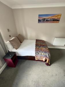 Postel nebo postele na pokoji v ubytování Tralee Holiday Lodge