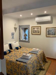Katil atau katil-katil dalam bilik di Villa Estefânia, Sintra