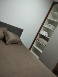 Postel nebo postele na pokoji v ubytování Rose Prime Loft