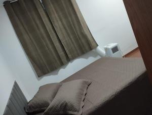 Postel nebo postele na pokoji v ubytování Rose Prime Loft