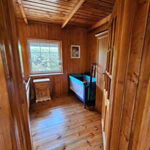 an inside view of a room in a wooden house at Domek Malina in Nadole