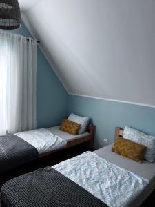 Afbeelding uit fotogalerij van Domek letniskowy "Pod dębem" in Urowo +18 foto's