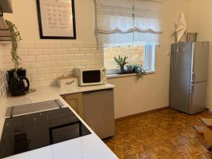 Afbeelding uit fotogalerij van Domek letniskowy "Pod dębem" in Urowo