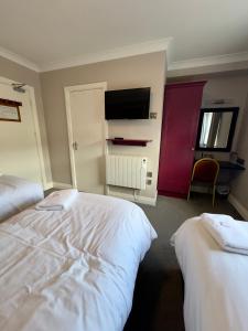 Postel nebo postele na pokoji v ubytování Tralee Holiday Lodge
