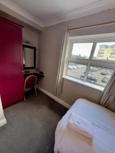 Postel nebo postele na pokoji v ubytování Tralee Holiday Lodge