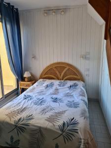 Ένα ή περισσότερα κρεβάτια σε δωμάτιο στο Appartement 2 chambres vue mer