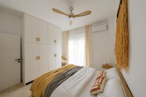 Postel nebo postele na pokoji v ubytování El Chacha Apartment