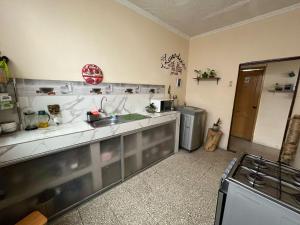 Kuchyň nebo kuchyňský kout v ubytování Pachamac Casa