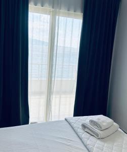 Ένα ή περισσότερα κρεβάτια σε δωμάτιο στο Hotel Mane