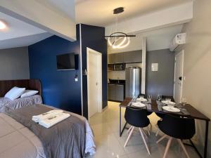 Ένα ή περισσότερα κρεβάτια σε δωμάτιο στο Loft Dona Clara 203 no Centro de Pomerode