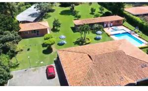 an aerial view of a house with a yard at finca el eden ginebra valle in Ginebra +7 photos