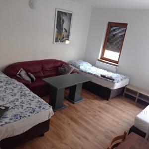 Postel nebo postele na pokoji v ubytování Penzion Pralinka