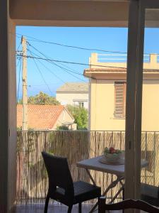 Balkón nebo terasa v ubytování Appartement à Erbalunga face à la mer