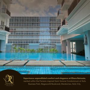 einen externen Blick auf ein Gebäude mit einem Pool in der Unterkunft Luxury Condo in Iloilo City by Eliara Retreats in Iloilo City