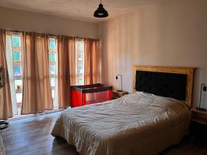 Postel nebo postele na pokoji v ubytování Vivienda en Cuchi Corral