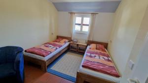 Postel nebo postele na pokoji v ubytování Haus Benny