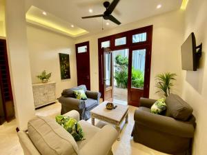 Ruang duduk di Boutique Hotel Casa Grande, Mango Tango Suite