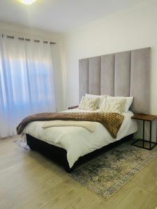 Ένα ή περισσότερα κρεβάτια σε δωμάτιο στο Bay Family Nest