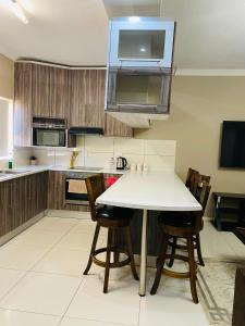 Η κουζίνα ή μικρή κουζίνα στο Bay Family Nest