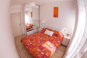 Postel nebo postele na pokoji v ubytování Apartments Lumiere