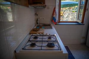 Kuchyň nebo kuchyňský kout v ubytování L'ulivo - Nature & Relax