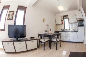 Kuchyň nebo kuchyňský kout v ubytování Apartments Lumiere