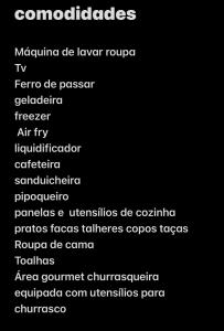 a black screen with a bunch of numbers on it at Casa com piscina in São Pedro da Aldeia