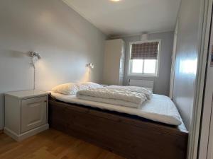 Ένα ή περισσότερα κρεβάτια σε δωμάτιο στο Appartment at Stølstunet in Beitostølen