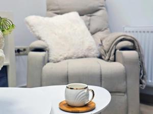 Posezení v ubytování Top Center SofiaLuxRentals - Vitosha blvd Apartment + 29 fotografií