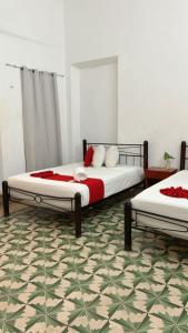Postel nebo postele na pokoji v ubytování Hotel Margarita