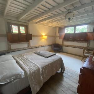 Ένα ή περισσότερα κρεβάτια σε δωμάτιο στο Cabana na Serra