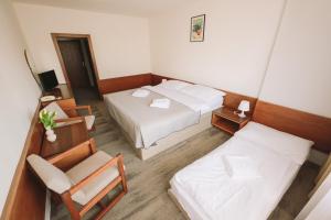 ATLAS Hotel Tatry客房内的一张或多张床位
