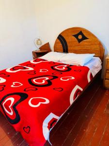 Postel nebo postele na pokoji v ubytování Ukumari Hostel