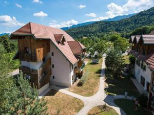 an aerial view of a building with mountains in the background at Charming Savoyard Apartment in Giez +31 photos