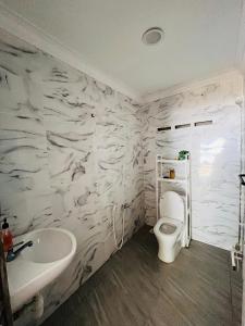 Koupelna v ubytování Mek Kiting Chalet Campsite