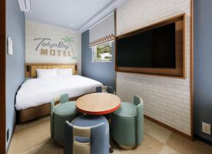 Postel nebo postele na pokoji v ubytování CVS Bay Hotel