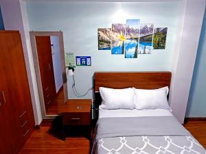 Postel nebo postele na pokoji v ubytování Hostal Valle Andino