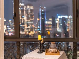 A balcony or terrace at Book and Bed - Yuyuan Garden