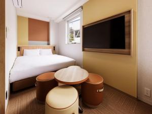 TV a/nebo společenská místnost v ubytování CVS Bay Hotel