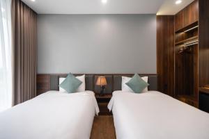 Katil atau katil-katil dalam bilik di Eden Hue Hotel