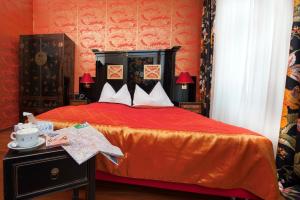 Postel nebo postele na pokoji v ubytování Boutique Hotel Kugel Wien