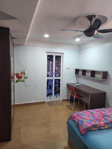 Postel nebo postele na pokoji v ubytování Kinrara HomeStay right at the Heart of Puchong + 5 fotografií