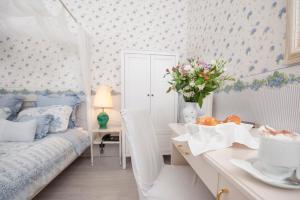Postel nebo postele na pokoji v ubytování Boutique Hotel Kugel Wien
