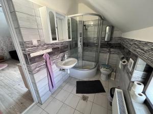 Koupelna v ubytování Nap körút Apartman