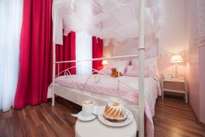 Postel nebo postele na pokoji v ubytování Boutique Hotel Kugel Wien