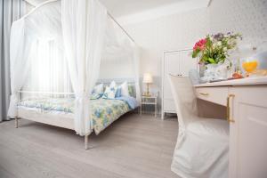 Postel nebo postele na pokoji v ubytování Boutique Hotel Kugel Wien