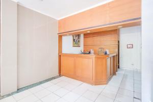 a kitchen with a sink and a counter at Hotel O Bogor near Taman Safari formerly Hotel Rudian 1 in Bogor +29 photos