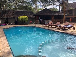 Bazén v ubytování Villa Elementaita 3 bedroom with Swimming pool Nakuru nebo v jeho okolí